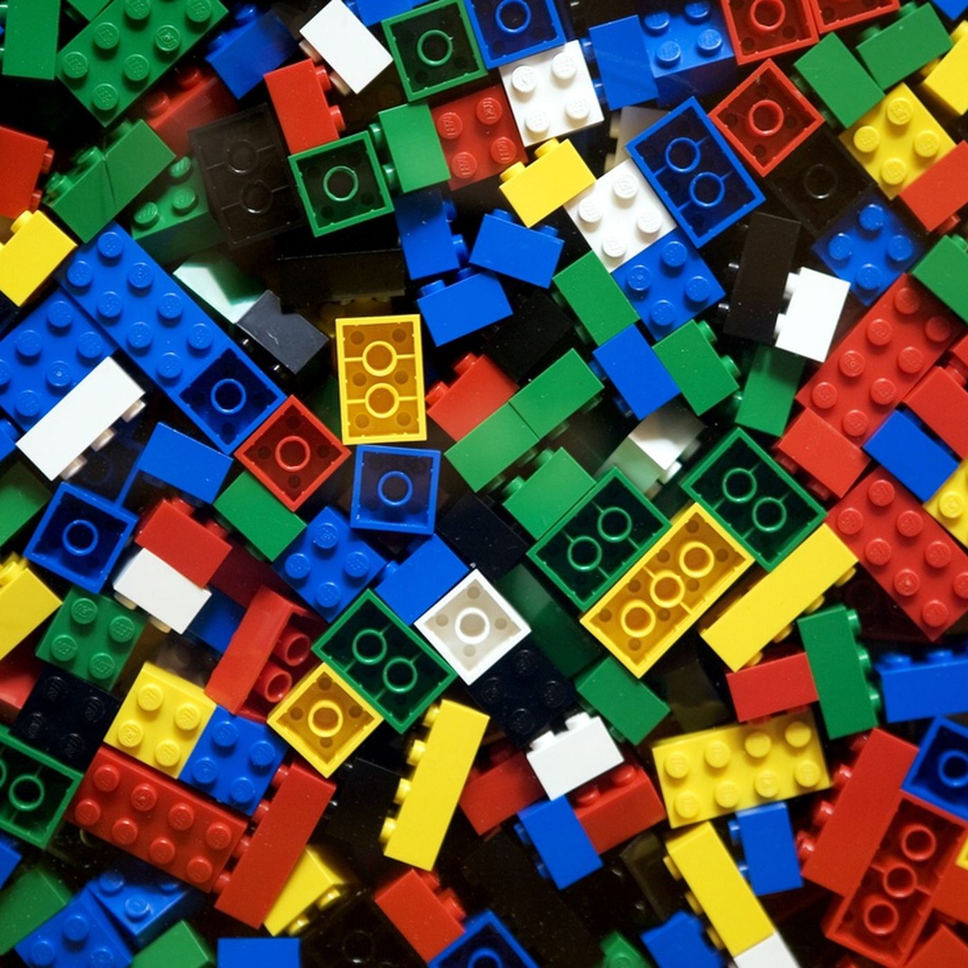 Image of multicolored legos jumbled together.