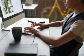 An image of a person using the computer.